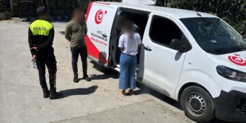 Police Conduct Permit Inspection Near University in Lefke